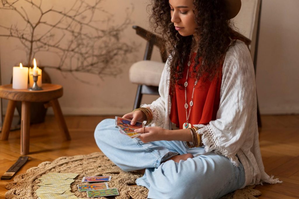 side view woman reading tarot