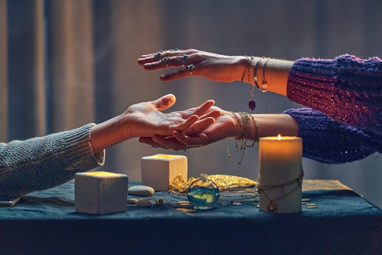witch-woman-spelling-hand-palm-occult-spiritual-rite-divination-ritual around candles other magical accessories magic illustration